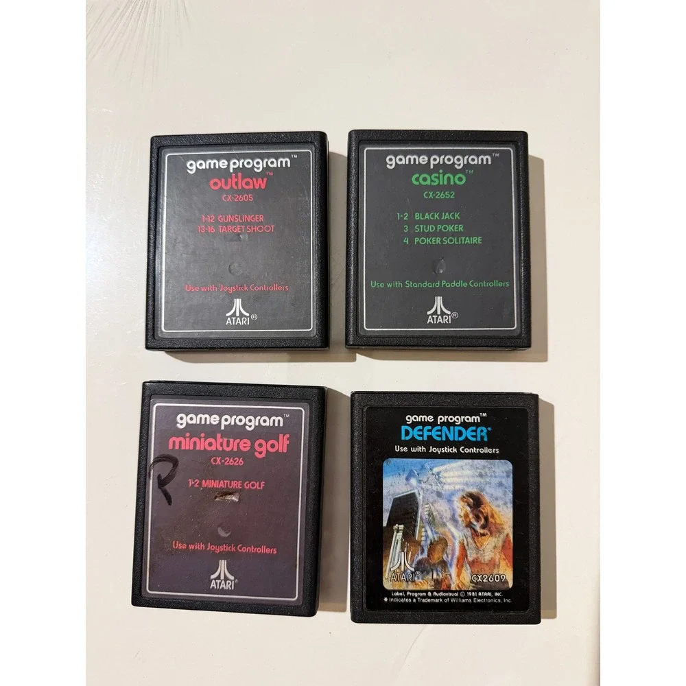 Atari 2600 Game Cartridge Lot of 4 Defender Outlaw Casino Miniature Golf CX-2609